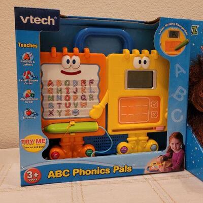 Lot 722: V Tech Phonic Pals + Stuffed Animals