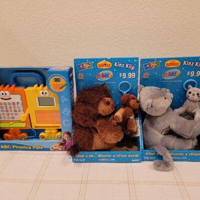 Lot 722: V Tech Phonic Pals + Stuffed Animals