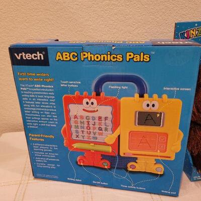 Lot 722: V Tech Phonic Pals + Stuffed Animals