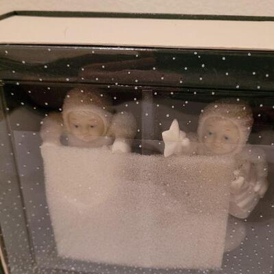 Lot 727: Assorted Dept 56 Snowbabies Christmas Figures 