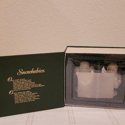 Lot 727: Assorted Dept 56 Snowbabies Christmas Figures 