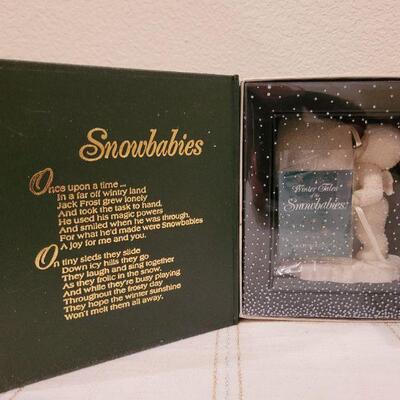 Lot 728: Assorted Dept 56 Snowbabies Christmas Figures 