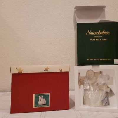 Lot 729: Assorted Dept 56 Snowbabies Christmas Figures 
