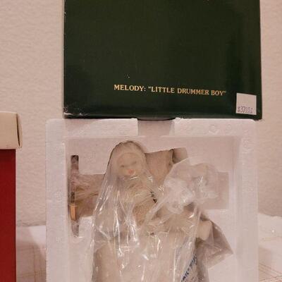 Lot 729: Assorted Dept 56 Snowbabies Christmas Figures 