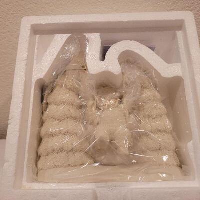 Lot 730: Assorted Dept 56 Snowbabies Christmas Figures 