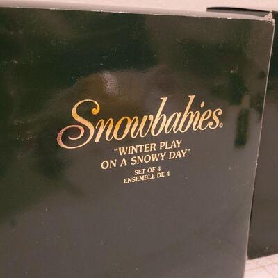 Lot 730: Assorted Dept 56 Snowbabies Christmas Figures 