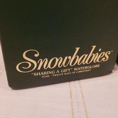 Lot 731: Assorted Dept 56 Snowbabies Christmas Figures 