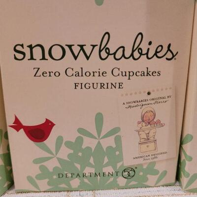 Lot 739: Assorted Dept 56 Snowbabies Christmas Figures 
