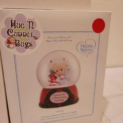 Lot 741: Assorted Dept 56 Snowbabies Christmas Figures 
