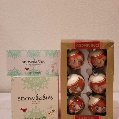 Lot 742: Assorted Dept 56 Snowbabies Christmas Figures + Ornaments