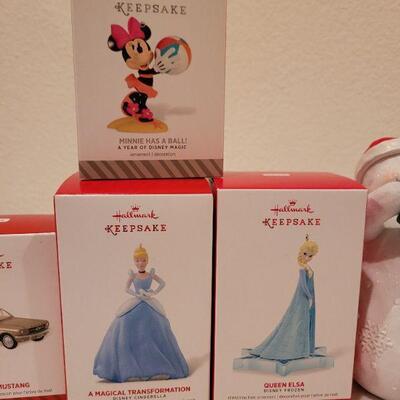 Lot 749: Assorted Hallmark Christmas Ornaments and Deco