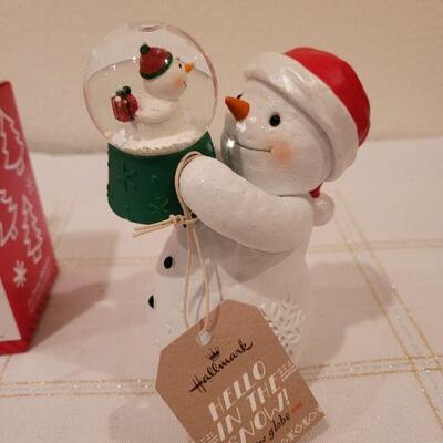 Lot 749: Assorted Hallmark Christmas Ornaments and Deco