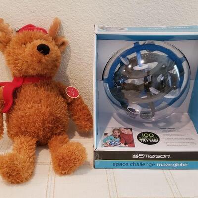 Lot 755: New Space Challenge Maze Globe & Reindeer Plushie