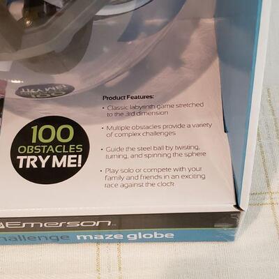 Lot 755: New Space Challenge Maze Globe & Reindeer Plushie