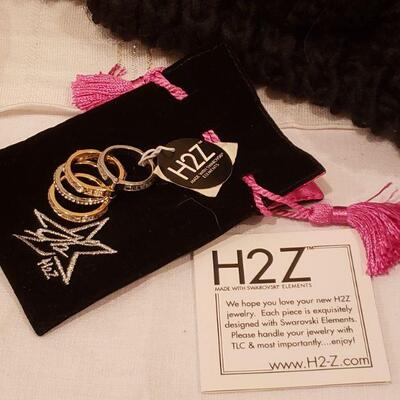 Lot 766: NEW Pom Pom Scarf. Christmas Socks, H2 Swarovski Elements Ring & Bear 