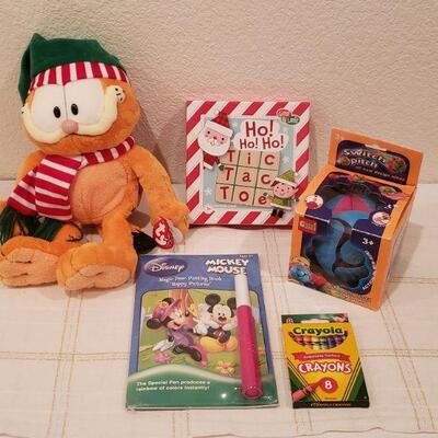Lot 770:  NEW Gift Lot (Game, Plushie, Activity Pad, Crayons, Toy)