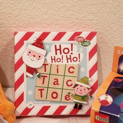 Lot 770:  NEW Gift Lot (Game, Plushie, Activity Pad, Crayons, Toy)