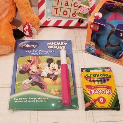 Lot 770:  NEW Gift Lot (Game, Plushie, Activity Pad, Crayons, Toy)
