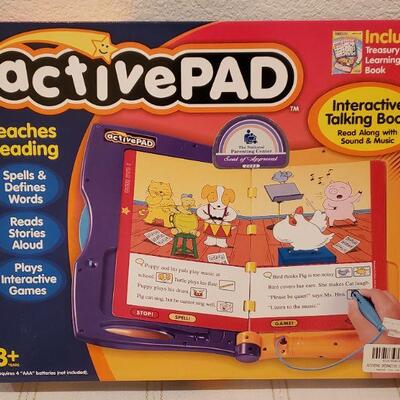 Lot 776: New Interactive Talking Book Active Pad & Reindeer Plushie 