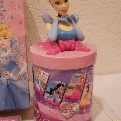 Lot 782:  NEW Disney Princess Jewelry, Decorations, Books, Puzzle- Butterfly Wallet and Penguin Plushie