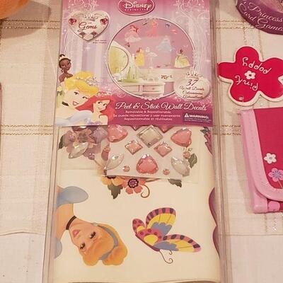 Lot 782:  NEW Disney Princess Jewelry, Decorations, Books, Puzzle- Butterfly Wallet and Penguin Plushie