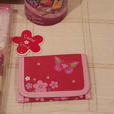 Lot 782:  NEW Disney Princess Jewelry, Decorations, Books, Puzzle- Butterfly Wallet and Penguin Plushie