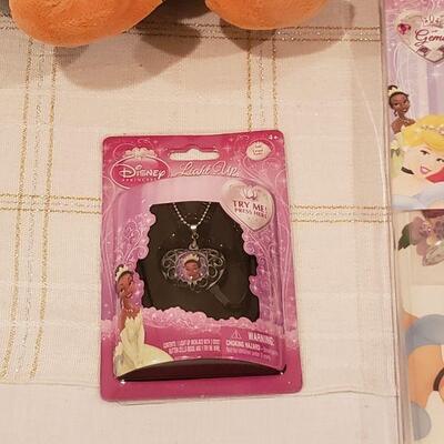 Lot 782:  NEW Disney Princess Jewelry, Decorations, Books, Puzzle- Butterfly Wallet and Penguin Plushie