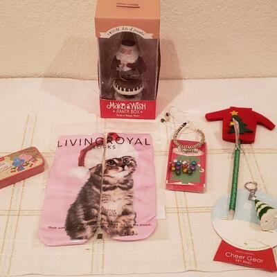 Lot 784:  New Holiday Cheer Lot- Kitty Socks, Lip Balm, Earrings, Bracelet, Pen, Cheer Gear & Santa Wish Box