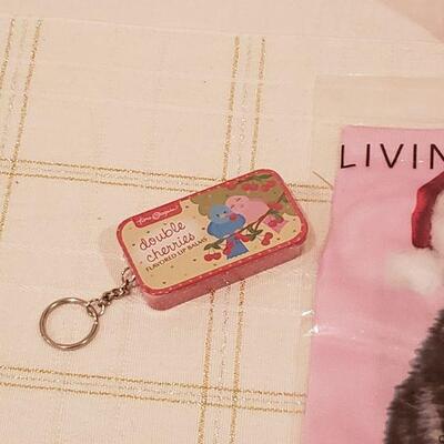 Lot 784:  New Holiday Cheer Lot- Kitty Socks, Lip Balm, Earrings, Bracelet, Pen, Cheer Gear & Santa Wish Box