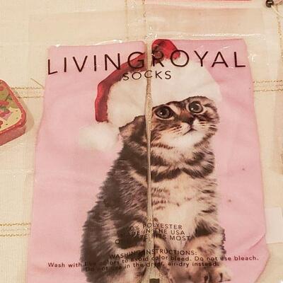 Lot 784:  New Holiday Cheer Lot- Kitty Socks, Lip Balm, Earrings, Bracelet, Pen, Cheer Gear & Santa Wish Box