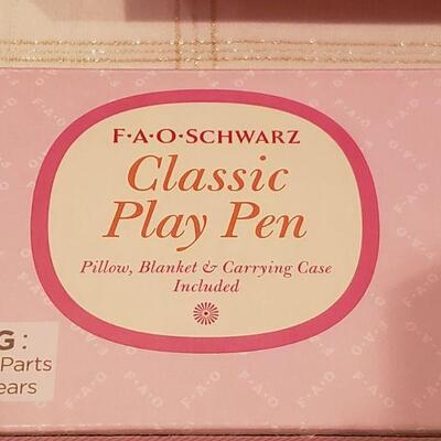 Lot 787: New 12" Baby Bella and FAO Doll Play Pen