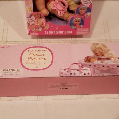 Lot 787: New 12" Baby Bella and FAO Doll Play Pen