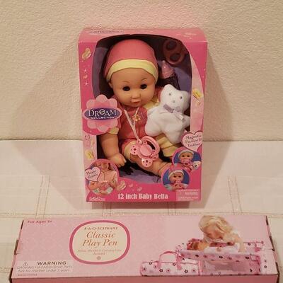 Lot 787: New 12" Baby Bella and FAO Doll Play Pen