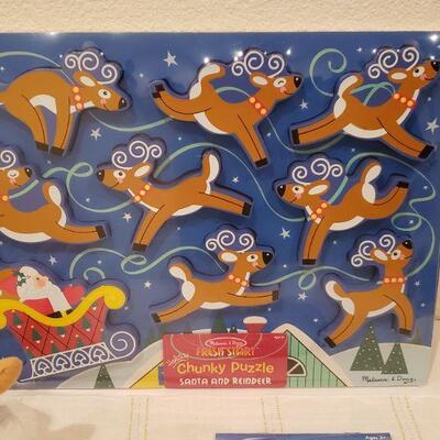 Lot 790: New Melissa & Doug Wood Puzzle, Mickey Mouse Activity Pad & "Jingle" Plushie 