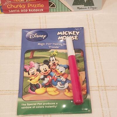 Lot 790: New Melissa & Doug Wood Puzzle, Mickey Mouse Activity Pad & "Jingle" Plushie 
