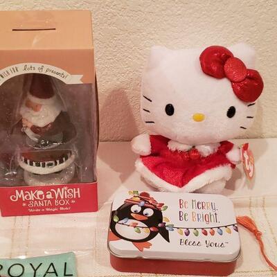 Lot 792: NEW (3) Bracelets, Jingle Bells Earrings, Christmas Dog Socks, Tin with Tissues, Santa Wish Box, HELLO KITTY Plushie