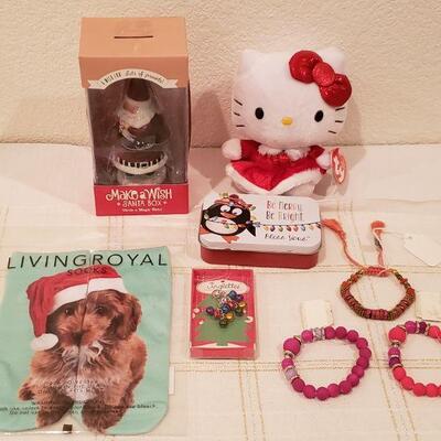 Lot 792: NEW (3) Bracelets, Jingle Bells Earrings, Christmas Dog Socks, Tin with Tissues, Santa Wish Box, HELLO KITTY Plushie
