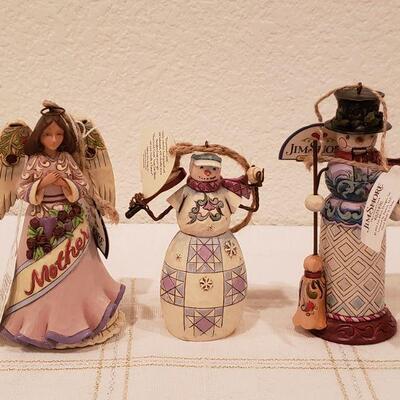 Lot 793:  (3) Jim Shores Snowman Nutcracker, Ornament & Mother Angel 