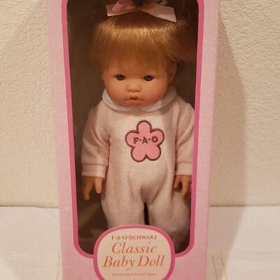 Lot 794: NEW FAO Baby Doll and FAO Doll Playpen 