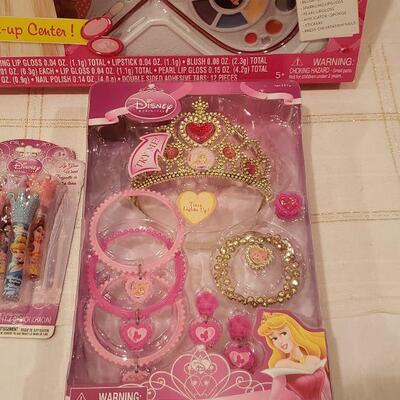 Lot 797:  New Barbie Make up Center, Disney Princess Tiara & Jewelry & Lip Gloss