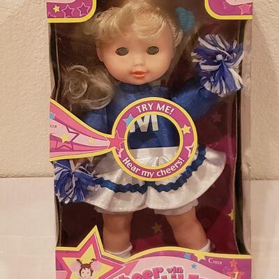 Lot 802: New Cheer Doll, Disney Princess Lip Gloss and bracelets 