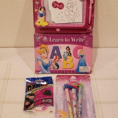 Lot 804: New Disney Princess Learn to Write Book, Pens and Bracelets 