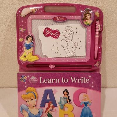 Lot 804: New Disney Princess Learn to Write Book, Pens and Bracelets 