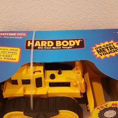 Lot 805: New Tootsie Toy Die Cast Bulldozer and "Jingle" Plushie 