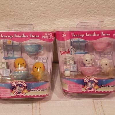 Lot 807: (4) Teacup Families Toys