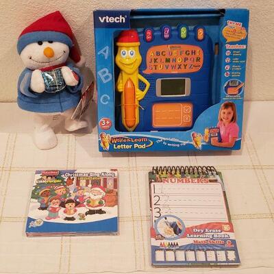 Lot 810: New VTech Toy, Activity Pads and Animated Snowman Plushie 