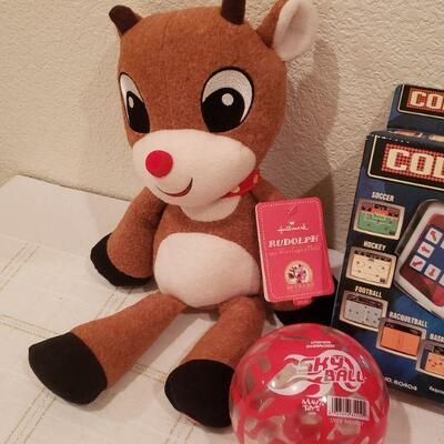 Lot 814: New Video Game, Bouncy Ball, Hot Cocoa Cup and Reindeer Plushie