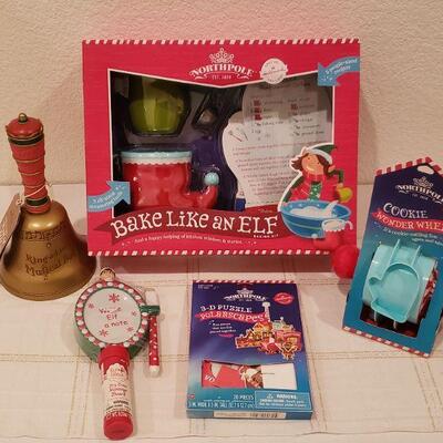 Lot 816: New Bake Like An Elf Set, Cookie Wonder Wheel, Elf Notes, 3D Puzzle, and Interactive Animated  Bell