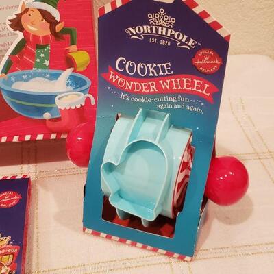 Lot 816: New Bake Like An Elf Set, Cookie Wonder Wheel, Elf Notes, 3D Puzzle, and Interactive Animated  Bell