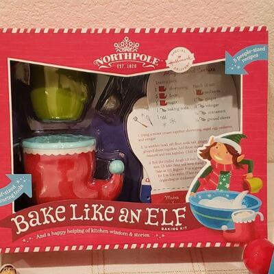 Lot 816: New Bake Like An Elf Set, Cookie Wonder Wheel, Elf Notes, 3D Puzzle, and Interactive Animated  Bell